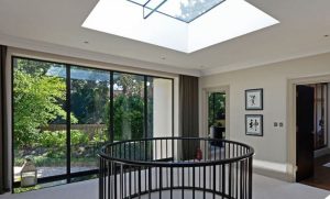 Glass rafter over staircase